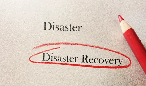 © Zimmytws | Dreamstime.com - <a href="https://www.dreamstime.com/stock-photo-disaster-recovery-text-circled-red-pencil-image58655762#res2965056">Disaster Recovery Photo</a>
